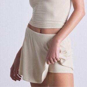 SKIMS soft lounge Mini Skirt with built in shorts in color Bone